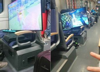 德國玩家超狂， 火車上打電動 還自備超大電視跟延長線