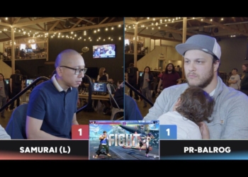 最強奶爸!一手抱孩子，一手玩快打旋風還是照樣可以奪冠